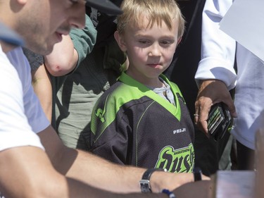 Cheerleaders, the NLL cup, pictures, autographs and loud applause at a champions rally for NLL Champions the Saskatchewan Rush in Bessborough Gardens, June 7, 2016.