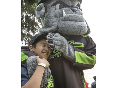 Pictures with the Rush's team mascot at a champions rally for NLL Champions the Saskatchewan Rush in Bessborough Gardens, June 7, 2016.