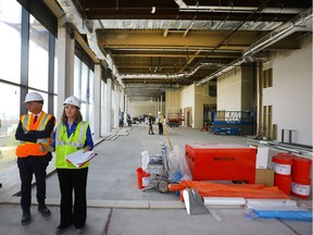 City of Saskatoon's special projects manager Jeanna South with Remai CEO Gregory Burke at a recent media a tour of the gallery under construction.