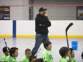 Garth Brooks cheers on participants of a team building exercise during the Saskatoon Teammates Procamp in Saskatoon, Saskatchewan on Saturday, June 11th, 2016. (Kayle Neis/Saskatoon StarPhoenix)