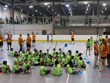 Kids practice hockey drills during the Saskatoon Teammates Procamp in Saskatoon, June 11, 2016.