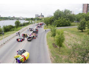 SASKATOON, SASK--JUNE 11 2016 9999 PRIDE PARADE- Parade marchers prepare their floats before the Saskatoon Pride Parade in Saskatoon, Saskatchewan on Saturday, June 11th, 2016. (Kayle Neis/Saskatoon StarPhoenix)