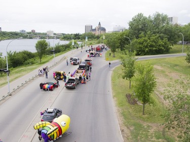 Parade marchers prepare their floats before the Saskatoon Pride Parade, June 11, 2016.