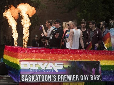 The Divas Nightclub float waves to onlookers during the Saskatoon Pride Parade, June 11, 2016.