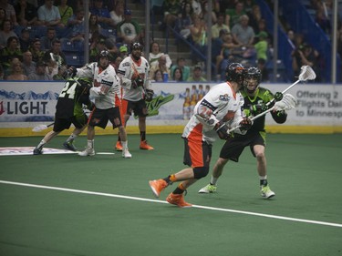 Bufalo Bandits #24 Mitch Jones moves past The Saskatchewan Rush during play during the NLL Championship game at SaskTel Centre in Saskatoon, June 4, 2016.