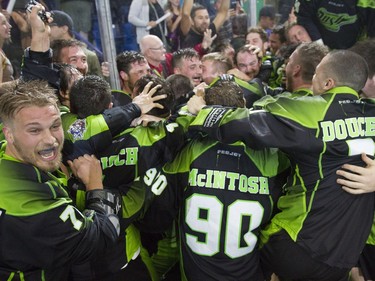 The Saskatchewan Rush celebrate after an 11-10 victory over the Buffalo Bandits during the NLL Championship game at SaskTel Centre in Saskatoon, June 4, 2016.