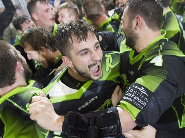 The Saskatchewan Rush celebrate after an 11-10 victory over the Buffalo Bandits during the NLL Championship game at SaskTel Centre in Saskatoon, June 4, 2016.