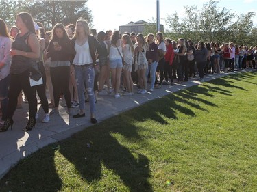 Fans wait in line for the Justin Bieber concert at SaskTel Centre in Saskatoon on June 16, 2016.