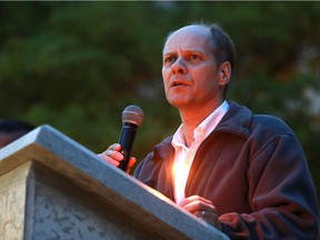 Daniel Kuhlen, Chair of the Islamic Association of Saskatchewan's media and outreach committee, speaks Sunday night in Saskatoon at the candlelight vigil for the 49 victims of the Orlando shooting.