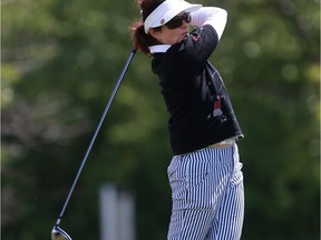 Ann Kirkland tees off at the Saskatoon Women's Open golf championship at the Saskatoon Golf and Country Club in Saskatoon on June 19, 2016.