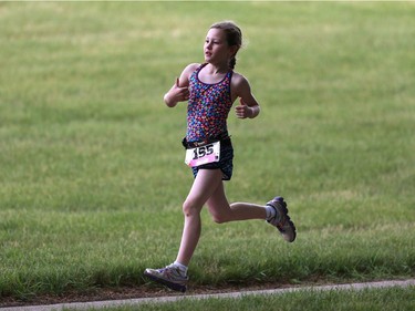 Georgia Rainville competes in the Kids of Steel Triathlon at Riversdale Pool and Victoria Park in Saskatoon on June 19, 2016.