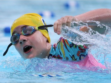 Molly Mulligan competes in the Kids of Steel Triathlon at Riversdale Pool and Victoria Park in Saskatoon on June 19, 2016.