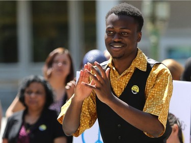 Elisha Muembo sings during World Refugee Day put on by the Saskatoon Refugee Coalition at Civic Square at City Hall in Saskatoon on June 20, 2016.