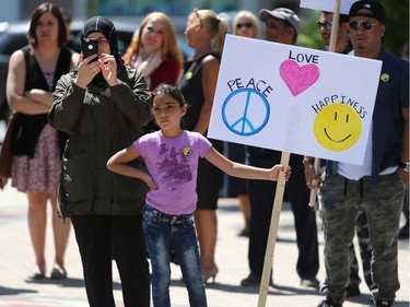 Najat Samoor and Hala Samoor celebrate World Refugee Day put on by the Saskatoon Refugee Coalition at Civic square at City Hall in Saskatoon on June 20, 2016.