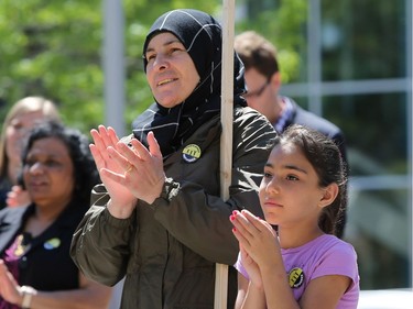 Najat Samoor and Hala Samoor celebrate World Refugee Day put on by the Saskatoon Refugee Coalition at Civic Square at City Hall in Saskatoon on June 20, 2016.