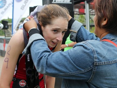 Jennifer Souter gets her medal after placing second in the women's category and 11th overall in the Subaru 5i50 Saskatoon Triathlon on June 26, 2016.