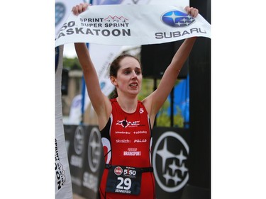 Jennifer Souter is the second woman to cross the finish line at the Subaru 5i50 Saskatoon Triathlon on June 26, 2016.