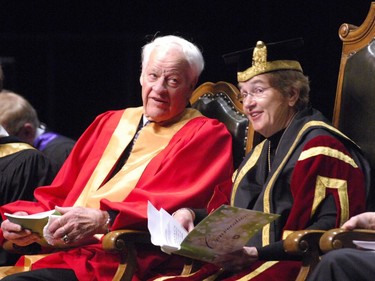 Gordie Howe receives his honorary doctorate of laws from the University of Saskatchewan in Saskatoon, June 3, 2010. Howe chats with U of S official Verz Pezer during the ceremony.