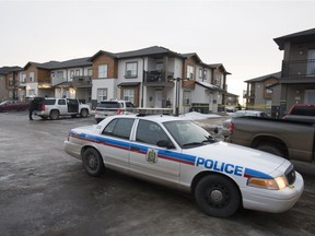 Saskatoon police investigate following a shooting on the 1000 block of Patrick Crescent on Jan. 26, 2015.