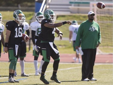 L-R: Brett Smith, Darian Durant and offensive coordinator Stephen McAdoo during Roughrider spring camp in Saskatoon, June 1, 2016.