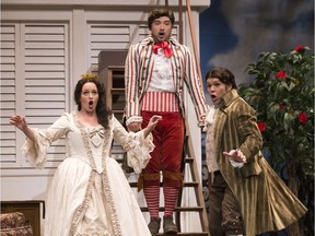 Danika Loren (from left), Ernesto Ramirez and Clarence Frazer (Figaro) perform a scene from Saskatoon Opera's Barber of Seville.