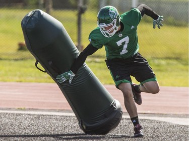 Defensive lineman Justin Capicciotti works a bag drill during Roughrider training camp at Griffiths Stadium, June 15, 2016.