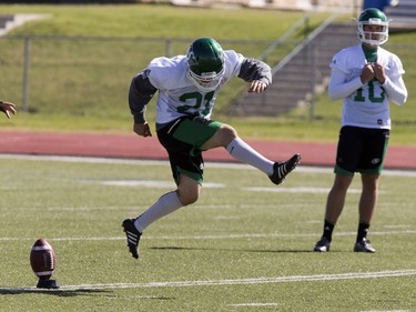 Kicker Tyler Crapigna simulates the kick in drills during Roughrider training camp at Griffiths Stadium, June 15, 2016.