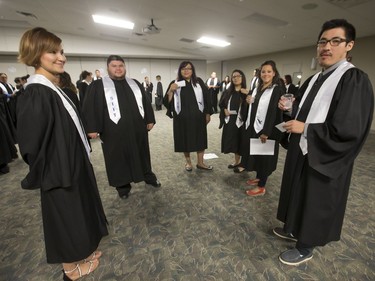 About 200 grads took part in convocation ceremonies for the Saskatchewan Indian Institute of Technologies at Prairieland Park, June 16, 2016. Backstage the grads had their photos taken and were instructed in the procession.