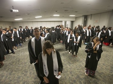 About 200 grads took part in convocation ceremonies for the Saskatchewan Indian Institute of Technologies at Prairieland Park, June 16, 2016. Backstage the grads had their photos taken and were instructed in the procession.