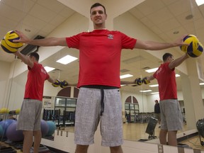 Team Canada volleyball player and 2016 Olympian Gavin Schmitt poses for a photo at the PAC. At 6'10", Schmitt fills the doorway and has an impressive wing span. (GREG PENDER/STAR PHOENIX)