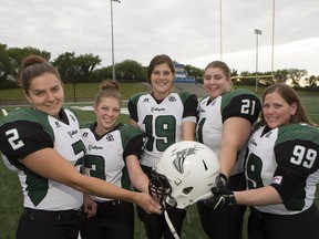 Sixth-year Valkyries players Beth Thomson (left), Tori Giles, Marci Kiselyk, Jaime Lammerding and Lori Smith pose for a photo this week at SMF Field.