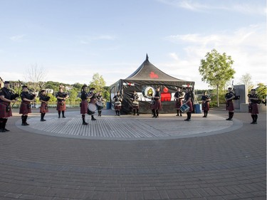 Members of the Saskatoon Police Pipes and Drums band perform at River Landing, Wednesday, June 22, 2016.