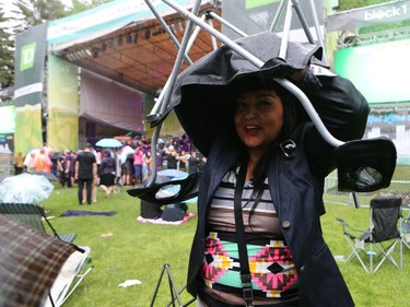 A downpour didn't stop the music or the fans who came to see Ms. Lauryn Hill play at the Bessborough Gardens main stage during the SaskTel Saskatchewan Jazz Festival, June 24, 2016.