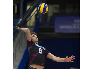 Portugal player Tiago Da Silva Violas serves against China during FIVB World Volleyball League action at Sasktel Centre in Saskatoon, June 24, 2016.