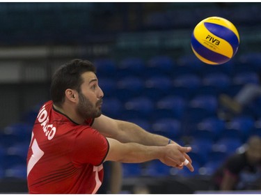 Portugal player Joao Fidalgo returns the ball against China during FIVB World Volleyball League action at Sasktel Centre in Saskatoon, June 24, 2016.