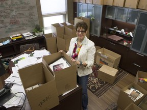 Daphne Taras, dean of the Edwards School of Business, packs up her office on campus Thursday. After six years as head of the U of S business school, Taras is leaving the post.