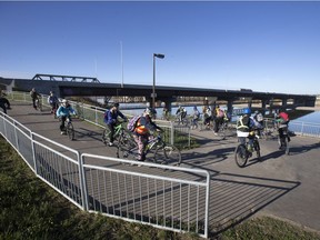 Students from the EcoJustice program at St. Edward School officially take to the Meewasin Valley Authority  trail during the official opening of 7km of new trail from Diefenbaker Park to Chief Whitecap Park,  Friday, October 16, 2015.