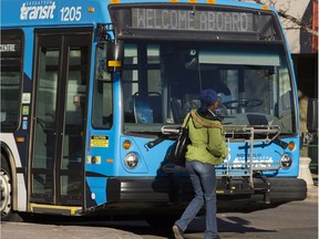 A bus with "welcome aboard" sign at the downtown bus terminal on Monday, October 20, 2014.