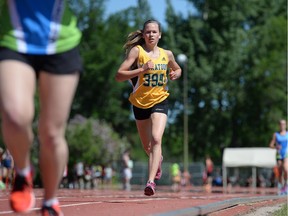 Shayna Uhryn of Saskatoon leads, and eventually wins, a 3000m race during the Saskatchewan High Schools Schools Athletic Association track and field championships held at Canada Games Athletics Complex in Regina, Sask. on Saturday June. 4, 2016.