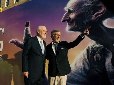 Director and producer Steven Spielberg (R) and composer John Williams pose together at the premiere of "The BFG" at the El Capitan Theatre on June 21, 2016 in Los Angeles, California.