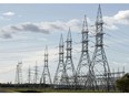 Structure carrying electricity near s Manitoba Hydro power distribution station.