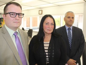 Superintendent of administrative services, Joel Lloyd, left, with Greater Saskatoon Catholic Schools Board Chair, Diane Boyko, and Director of Education Greg Chatlain following a special board meeting of the division, where the divisions' more than $241 million budget was tabled and approved. However, with the budget, comes sacrifice, as while the average classroom load won't be changing, aspect of the budget, like transportation, classroom renovations and technology upgrades for teachers will suffer.