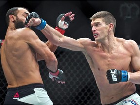 Welterweight Johny Hendricks takes a shot to the chin from Stephen Thompson during their UFC Fight Night 82 match at the MGM Grand Garden Arena in Las Vegas on Saturday, Feb. 6, 2016. Six fights and four years later, Stephen (Wonderboy) Thompson hasn't forgotten his loss to Matt (The Immortal) Brown.