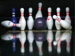 A bowling ball strikes the pins at the Super Bowl Lanes in East Windsor during "Rock and Bowl."