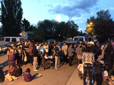 A scene from the July 5 candlelight vigil in Saskatoon for six-week-old Nikosis Jace Cantre, the city's ninth homicide victim.