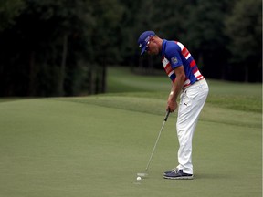 Graham DeLaet of Canada putts on the thirteenth green during the third round of the Barbasol Championship at the Robert Trent Jones Golf Trail at Grand National on July 16, 2016 in Auburn, Alabama.