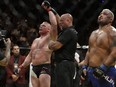 Brock Lesnar celebrates after defeating Mark Hunt during their heavyweight mixed martial arts bout at UFC 200, Saturday, July 9, 2016, in Las Vegas.