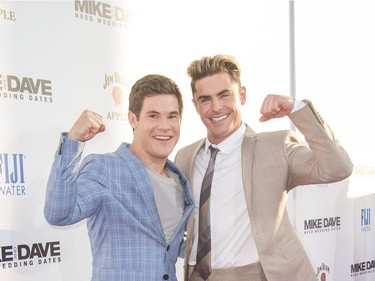 Actors Adam Devine (L) and Zac Efron attend the Twentieth Century Fox premiere of "Mike and Dave Need Wedding Dates" in Hollywood, California, June 29, 2016.