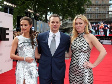 L-R: Actors Alicia Vikander, Matt Damon and Julia Stiles arrive at the premiere of "Jason Bourne" in London, England, July 11, 2016.