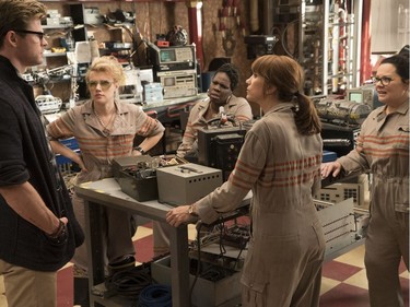 Chris Hemsworth, Kate McKinnon, Leslie Jones, Kristen Wiig and Melissa McCarthy star in "Ghostbusters."